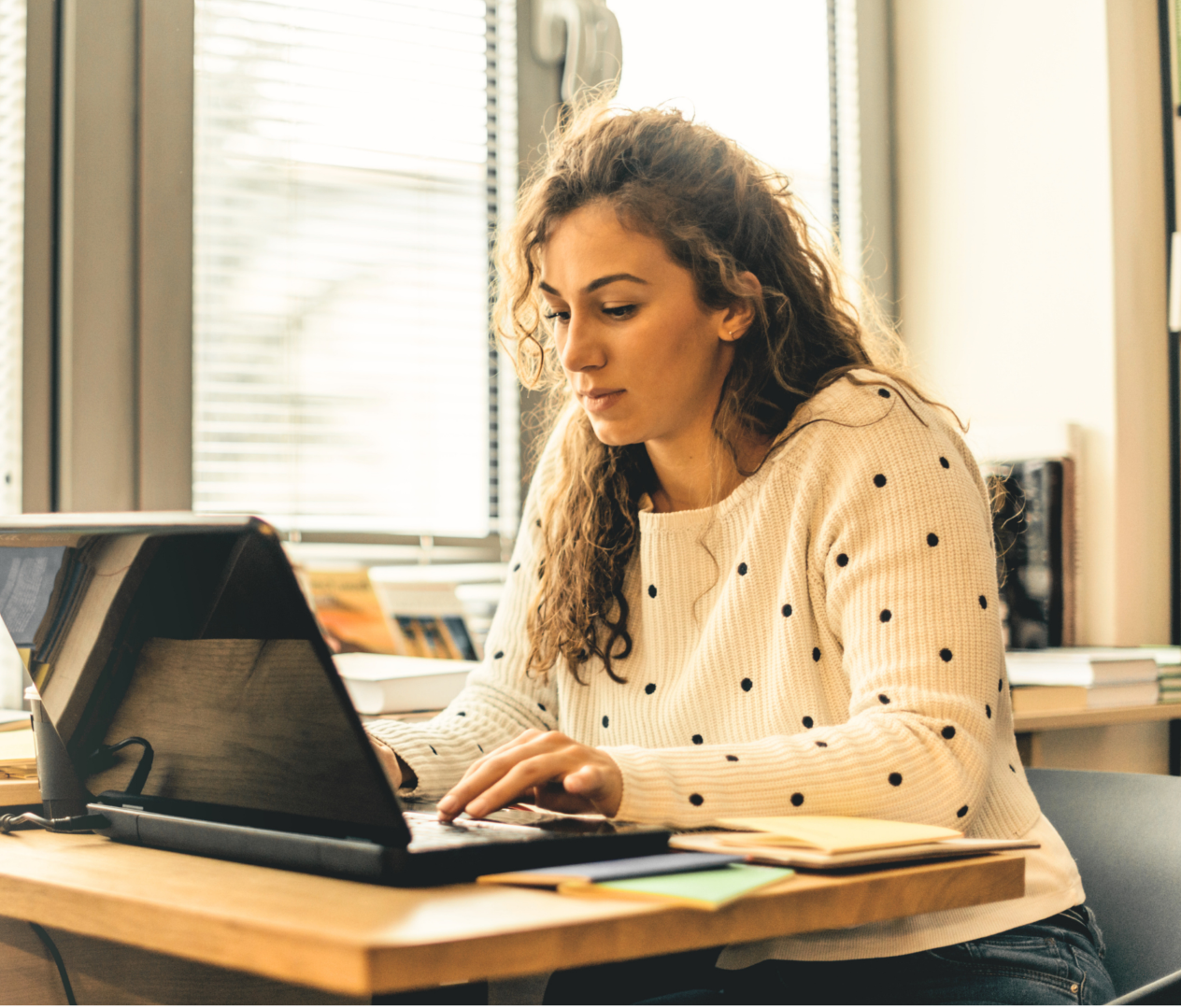 About Us Photo girl using laptop